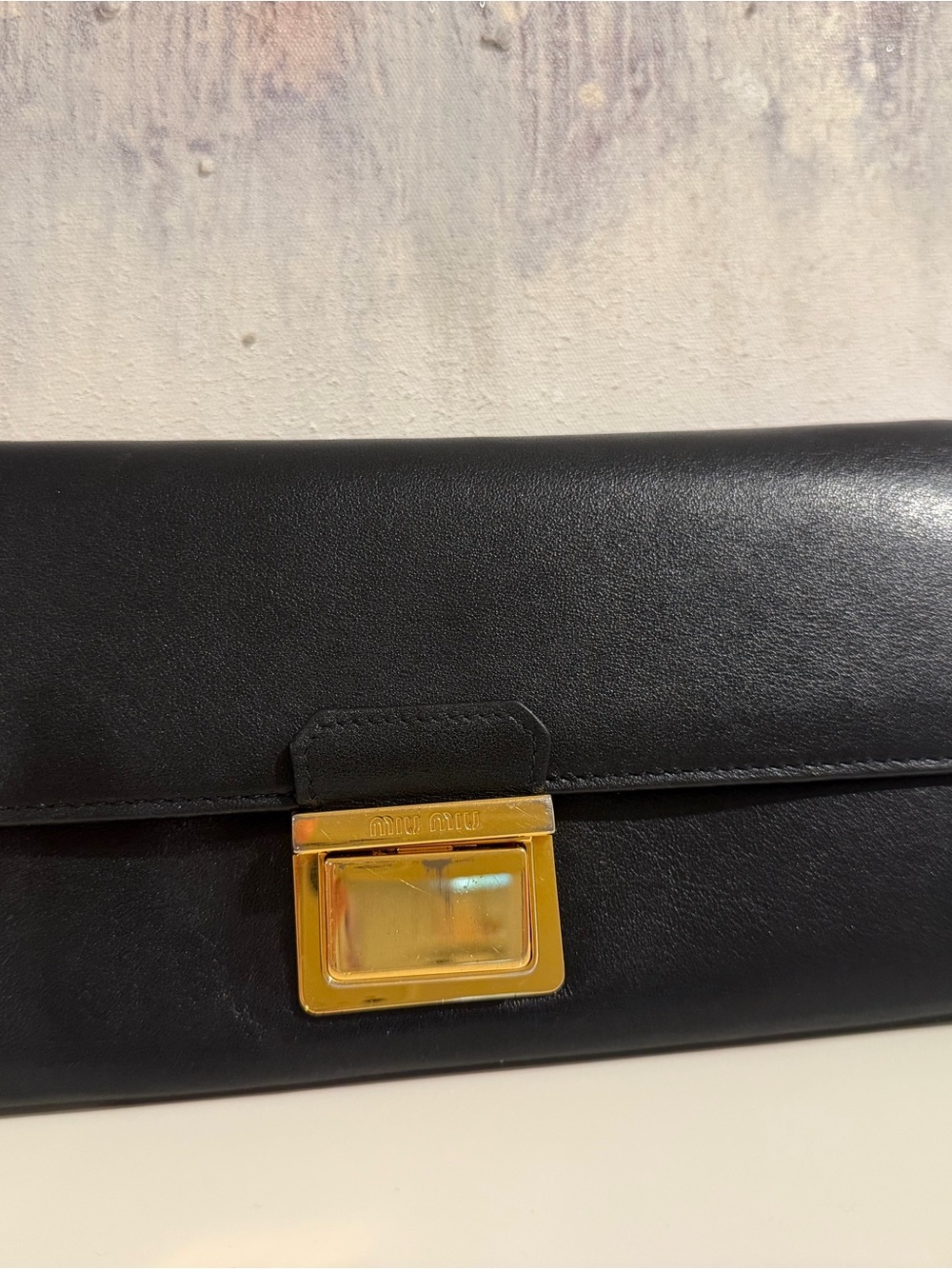 Miu Miu Black Leather Clutch with Gold-Tone Hardware